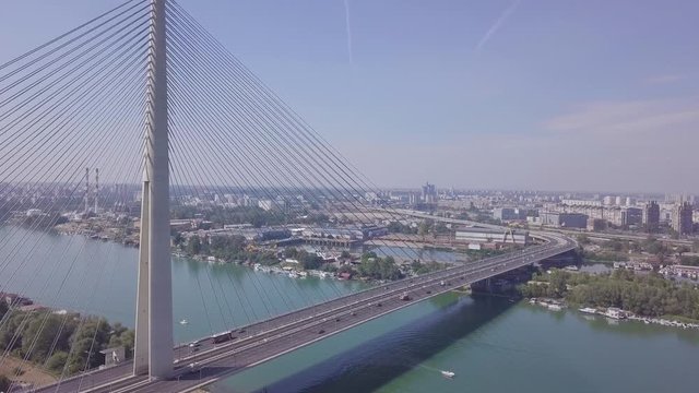 Fantastic 4k long aerial orbiting shot of Ada bridge in Belgrade, Serbia