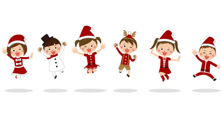 ポップな子供たちクリスマスのコスプレでジャンプ