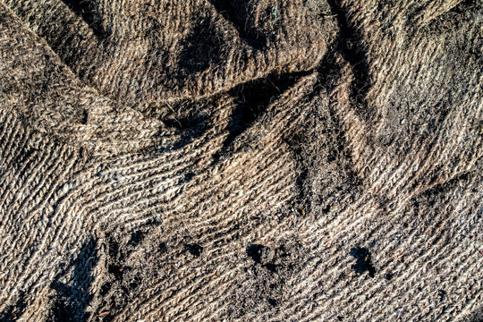 Dirty Woolen Cloth In The Ground On The Street.