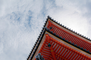 bottom view of a corner of a kiyomizu-dera buddhist temple pagoda