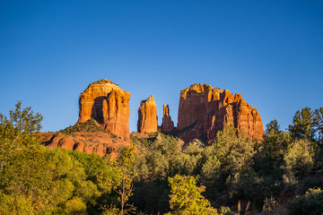 Cathedral Rock red sandstone butte formation in Sedona at sunset
