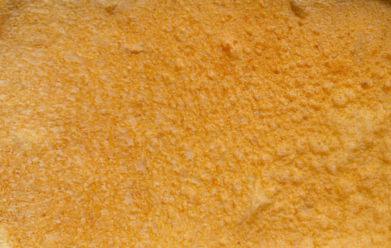Bread crust texture as background.