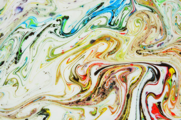 Abstract painting technique Ebru .Turkish style Ebru on the water with acrylic paints press waves.Modern art marble liquid texture