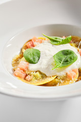 Ravioli with spinach, concasse and cheese espuma