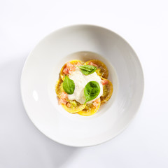 Ravioli with spinach, concasse and cheese espuma