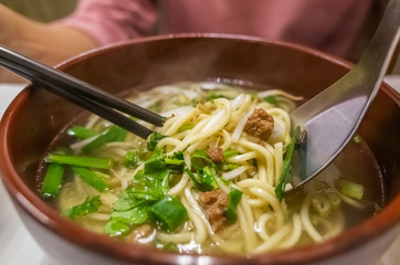 yellow noodles with soup