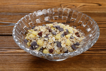 side view bowl of uncooked mixed cereal and grain