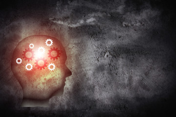businessman with cogs wheel in brain.
