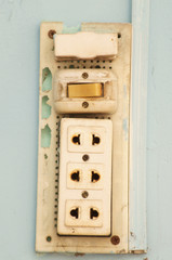 Old burned plug socket close up