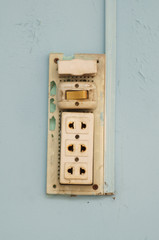 Old burned plug socket close up