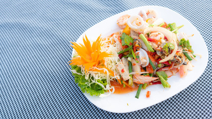 Spicy Mixed Salad on white dish, select focus.