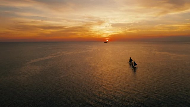 Sailing boats on the sea at the sunset at Boracay island,Philippines. Sailboat against a beautiful sunset. Sailing with a beautiful sunset.
