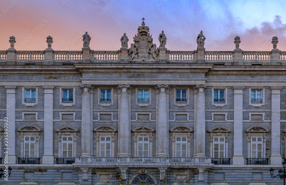 Wall mural sunset view of the ornate baroque architecture of the royal palace viewed from plaza de oriente in m