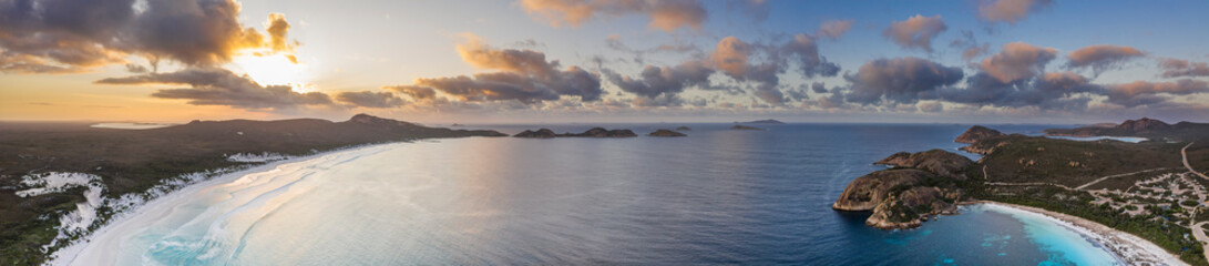 Fototapeta na wymiar Aerial panorama at sunrise of the beautiful turquoise waters and beach at Lucky Bay, located near Esperance in Western Australia