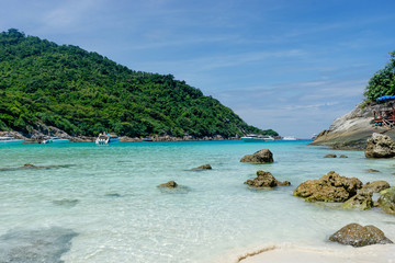 Fototapeta na wymiar View of tropical island beach with clear water, Coral Island, Koh Hey, Phuket, Thailand