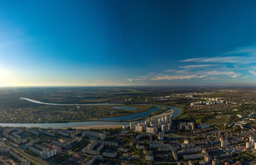 panorama view over the bend of the Kuban River at the western outskirts - the area of the agricultural university and the Novy Gorod microdistrict at the end of an autumn day before sunset