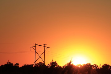 Power Line Silhouette's at Sunset with a colorful sky.
