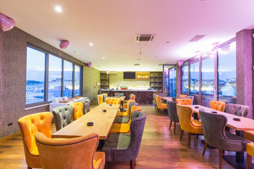 Interior of a hotel bar restaurant with party decoration