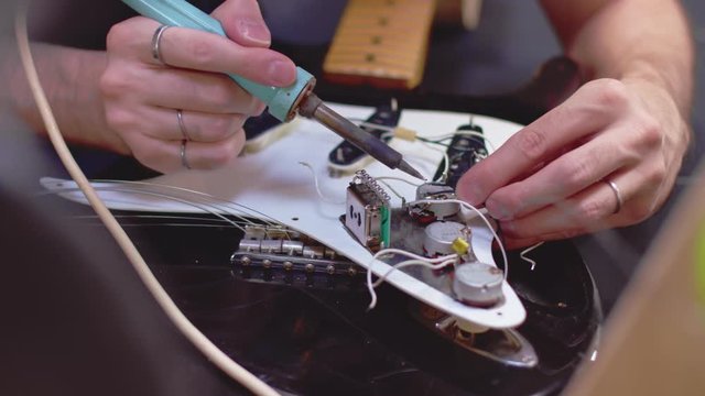 Behind the scenes of guitar making, electrical components
