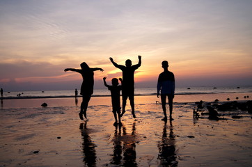 Fototapeta premium Shadow of people by the sea.