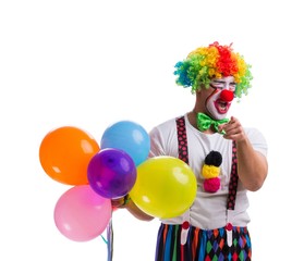 Obraz na płótnie Canvas Funny clown with balloons isolated on white background