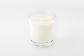 Obraz na płótnie Canvas The glass of milk isolated on white background.