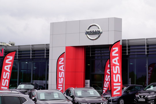 Nissan Dealership Sign In Front Of Showroom Store Japanese Brand