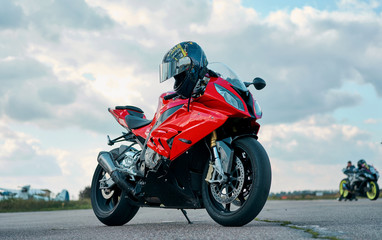 beautiful red motorcycle on the road - obrazy, fototapety, plakaty