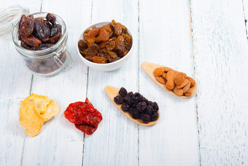dried fruits on white wooden table
