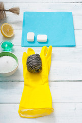 dishwashing products on white wood table
