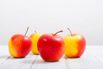 apple fruits on old white wooden table