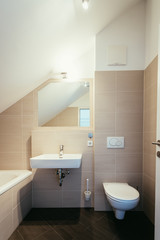 Fototapeta na wymiar Small clean modern bathroom in an apartment