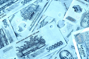 Vietnamese dong bills close up, blue color toned