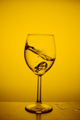 Glass with water up and splash