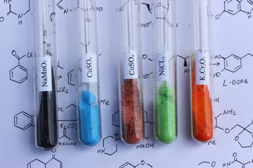 Chemical reagents. Colored inorganic salts in test tubes. - obrazy, fototapety, plakaty