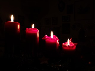 red candles in the christmas time on the fourth advent