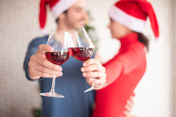Attractive Caucasian couple of love are  celebrating Christmas in home
