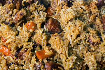 Cooking of traditional Uzbek pilaf