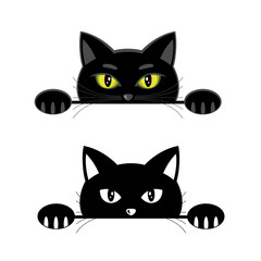 Peeping black cat with yellow eyes