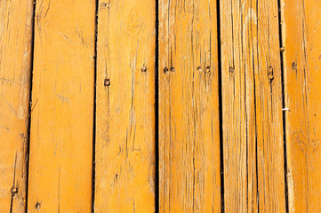 wood texture painted yellow with paints