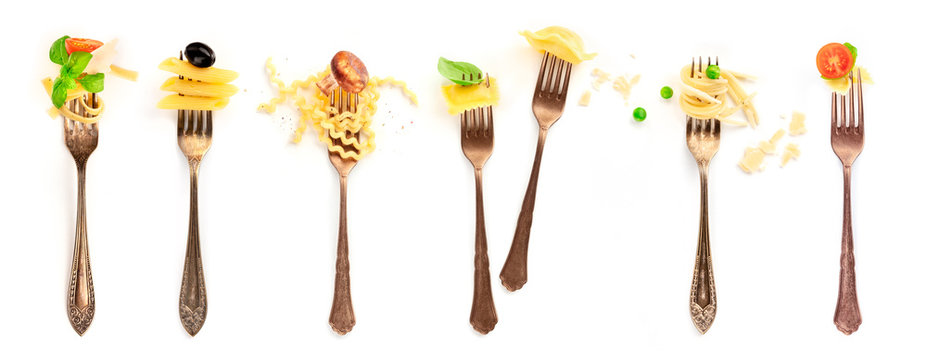 Italian food collage. Pasta design elements. Many forks with pasta and various addings, shot from the top on a white background