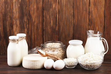 Jugs of milk and dairy products arrangement