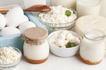 Obraz na płótnie Canvas High view dairy products on white table