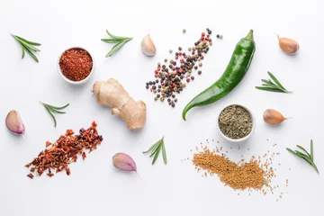 Rolgordijnen Different spices on white background © Pixel-Shot