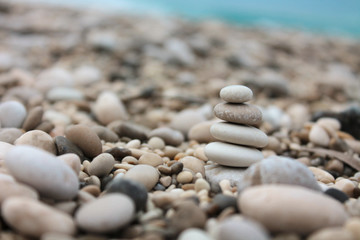 Fototapeta na wymiar Small cairn on a beach