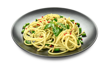 Plate with tasty pasta on white background