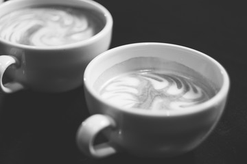 Porcelain cups with coffee