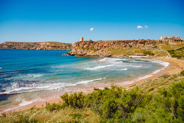 Golden Bay Malta summer tourist resort beach azure water sea, . Concept travel - obrazy, fototapety, plakaty