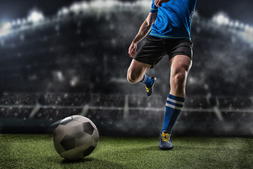 Soccer players in action on professional stadium.