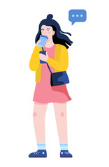 Beautiful fashion woman standing and holding a cup of coffee